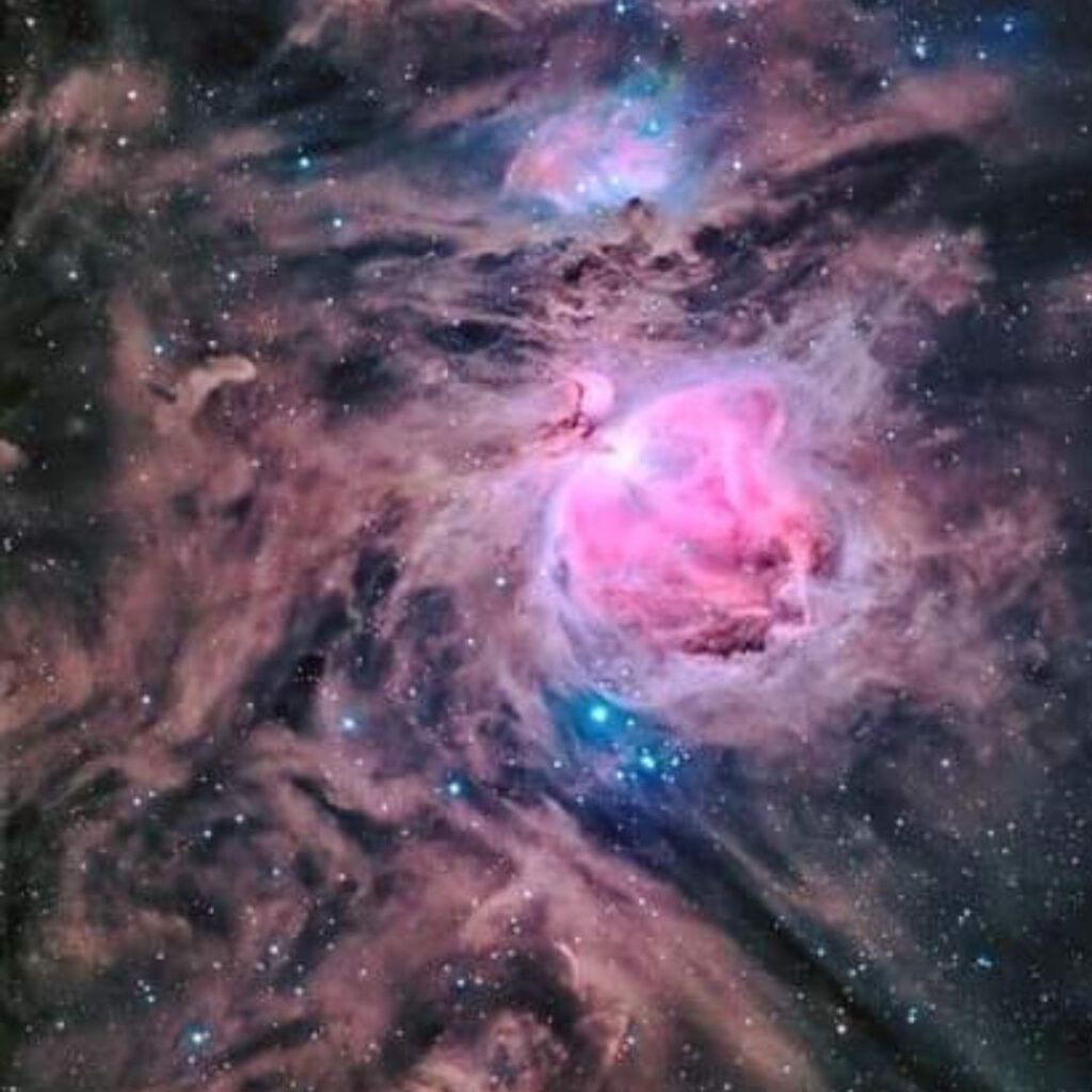 Eine Galaxie aus rosa und blauen Farben